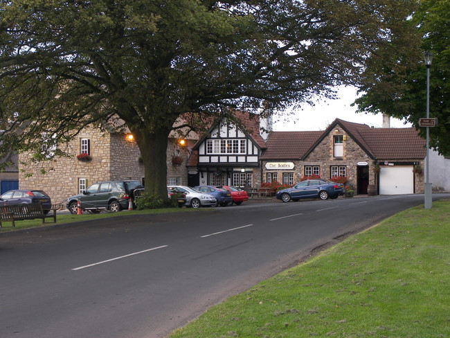 We cross the finish line at The Border hotel, Kirk Yetholm